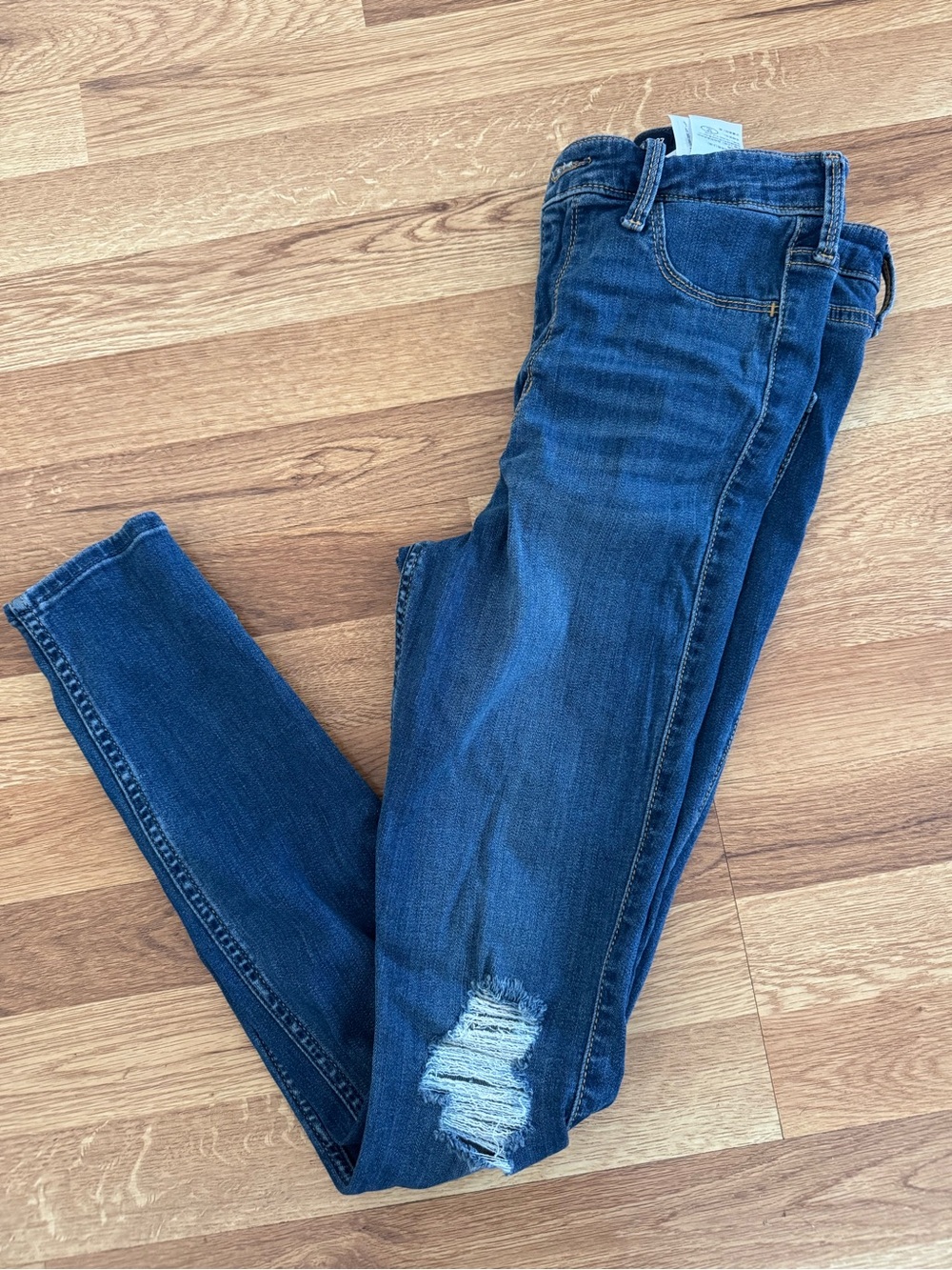 Hollister Women's Indigo Skinny Jeans with Knee Distress